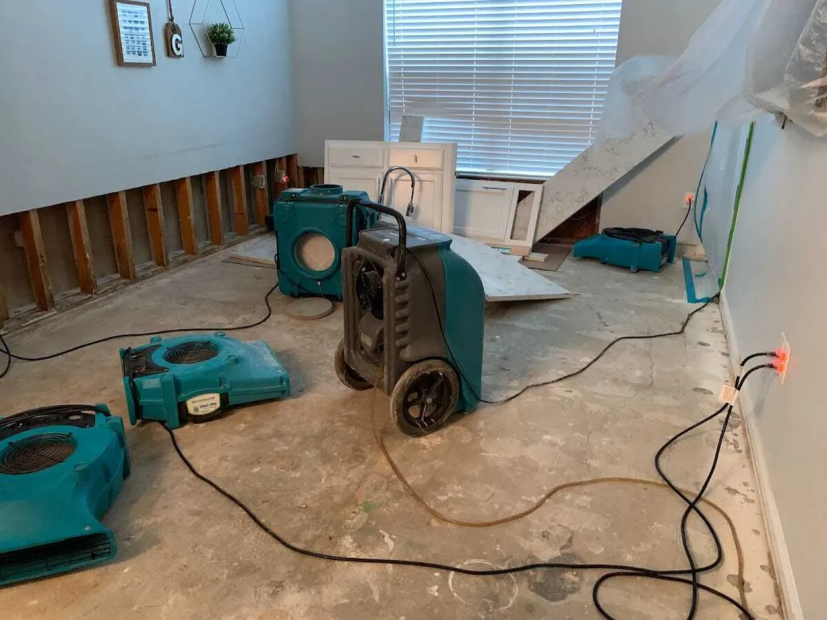 Dehumidifier in flood-cut room for Water Damage Restoration in Howell